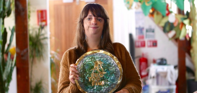 LoveLove Animator JoAnne with the Ekotopfilm award for 'We Save Land'.